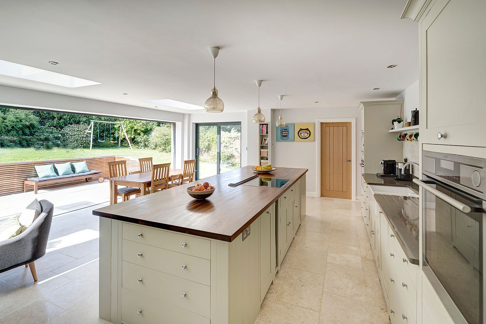 The original rear layout felt enclosed and disconnected from the garden, leading the project to focus on opening the house towards the landscape.