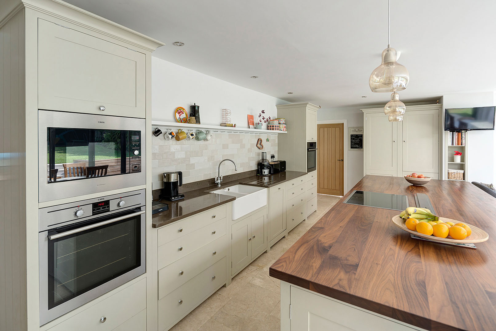 a large open-plan kitchen and dining area with a better connection to the garden.
