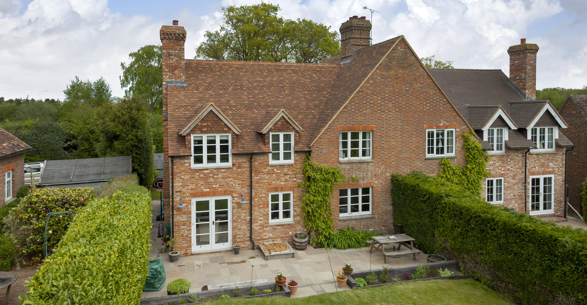 Sunny Bank reimagines a modest Victorian workers’ cottage in Flimwell, carefully extending the home while preserving the character and craftsmanship of the original building.