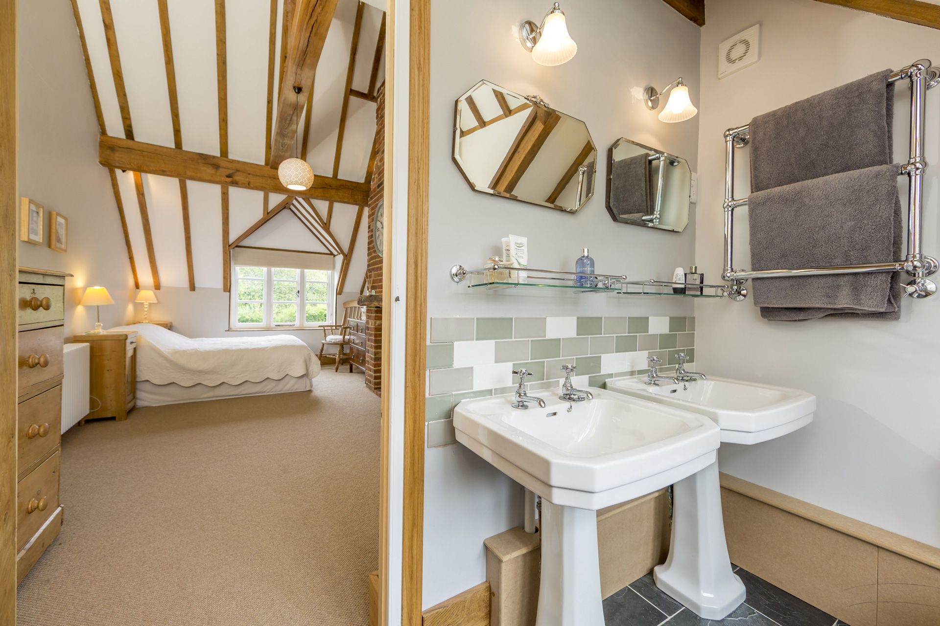 The project transforms the former two-bedroom cottage into a generous four-bedroom family home, balancing traditional architectural language with a more open and connected layout suited to contemporary living.