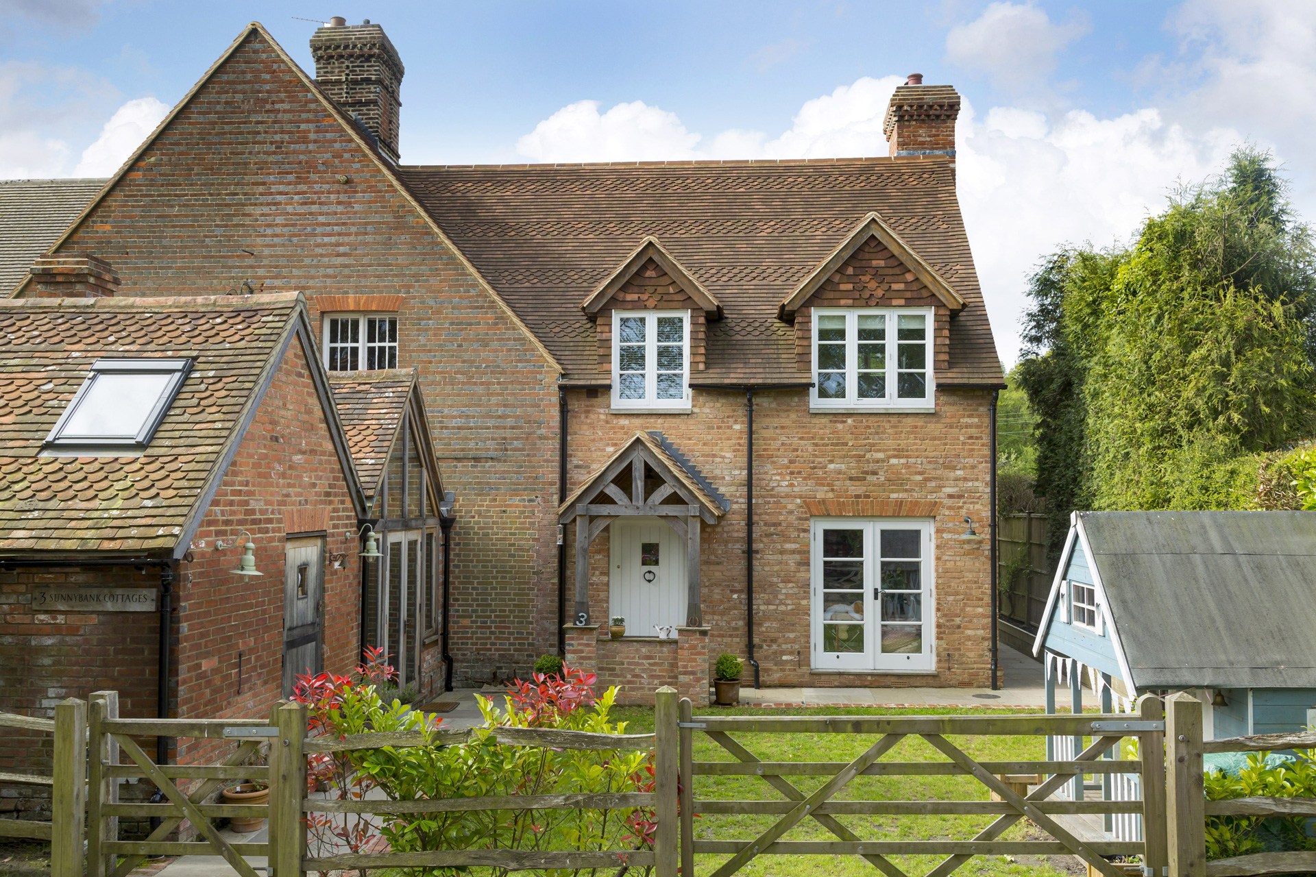 The result is a home that feels naturally evolved over time, combining contemporary family living with the warmth, texture and scale of the original Victorian cottage.