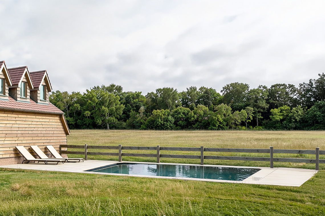 This approach allows the home to grow while keeping the overall height modest and in keeping with the surrounding houses.