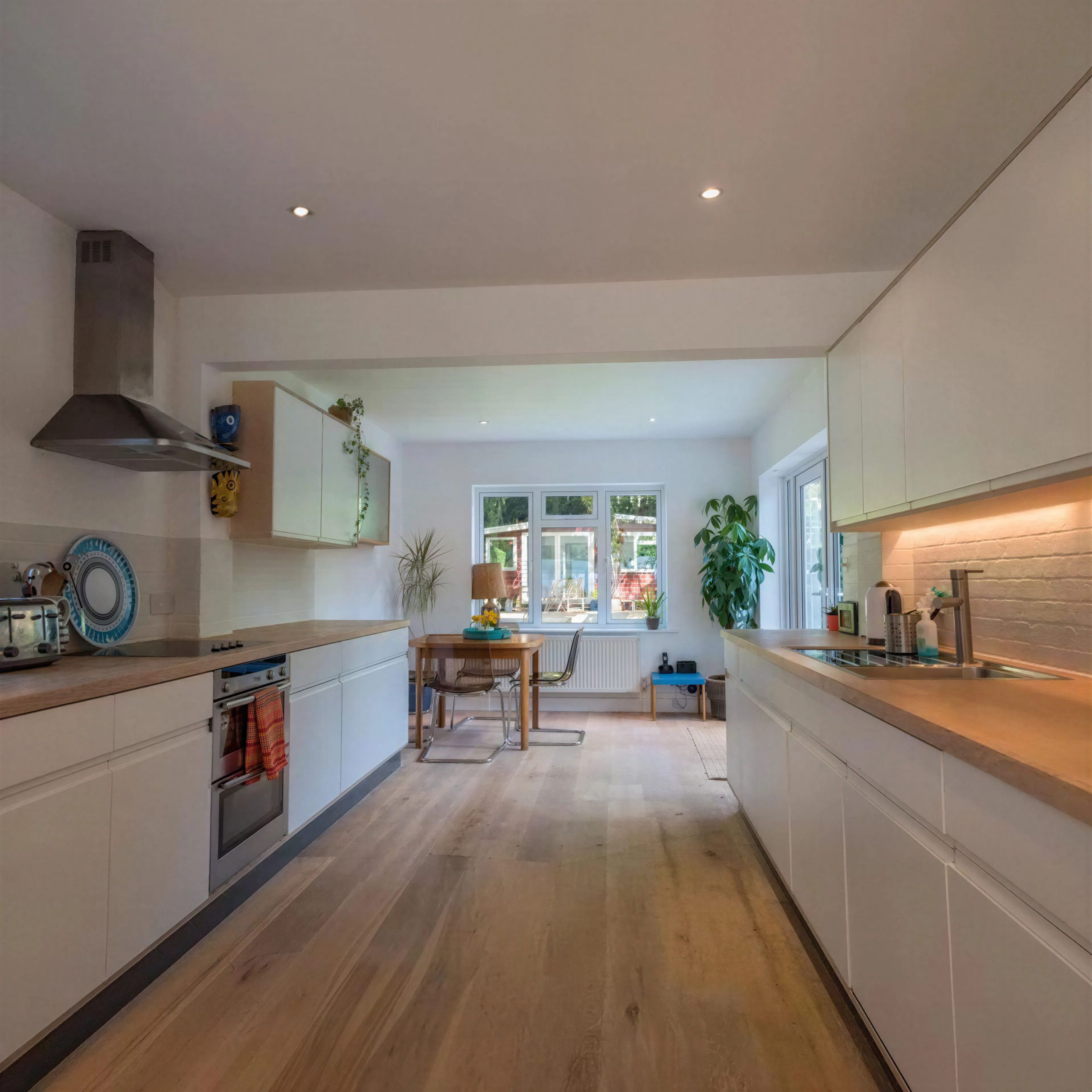 Open-plan kitchen within a Dutch barn-style home conversion, creating bright contemporary living spaces following a complete interior remode